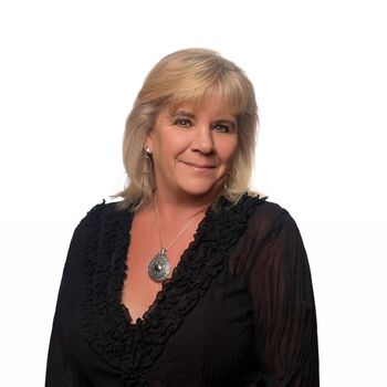 Portrait of Judy 'Jo' Overin, REALTOR®.